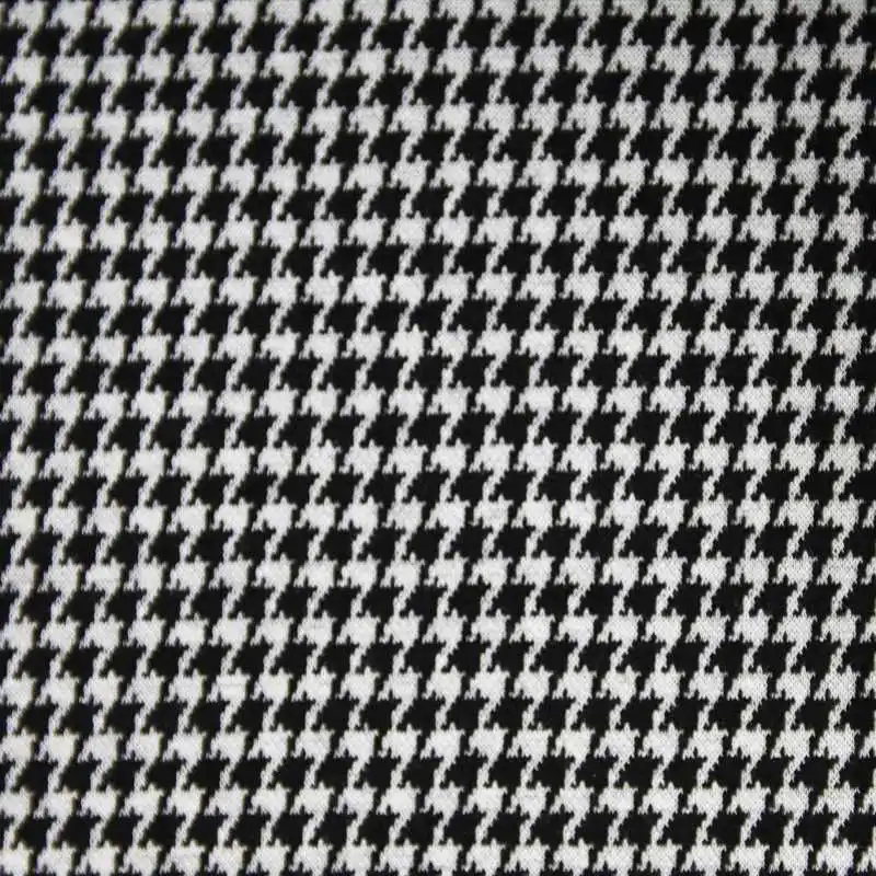 What is houndstooth knitted jacquard fabric, and how is it created?