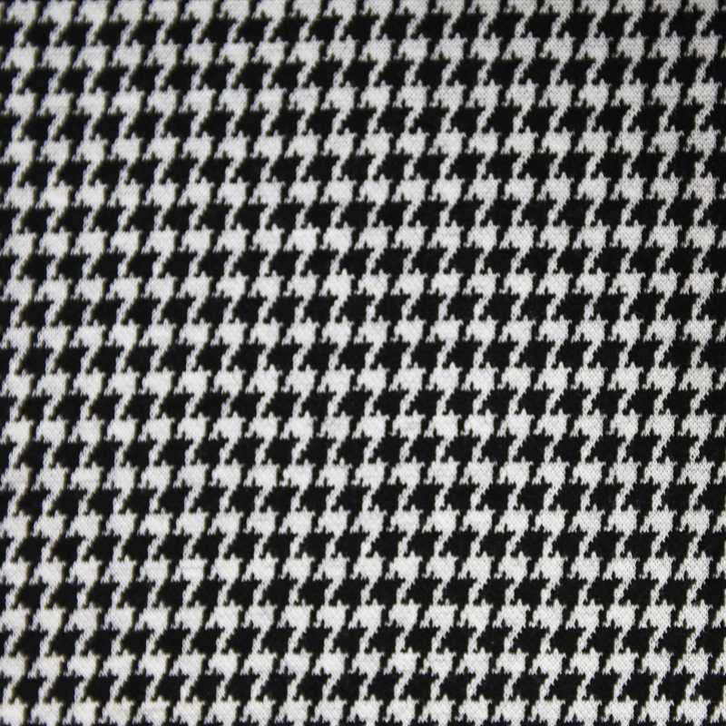 What is houndstooth knitted jacquard fabric, and how is it created?
