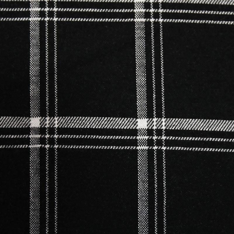 Are there any specific care instructions or considerations when working with jacquard black and white grid fabric?