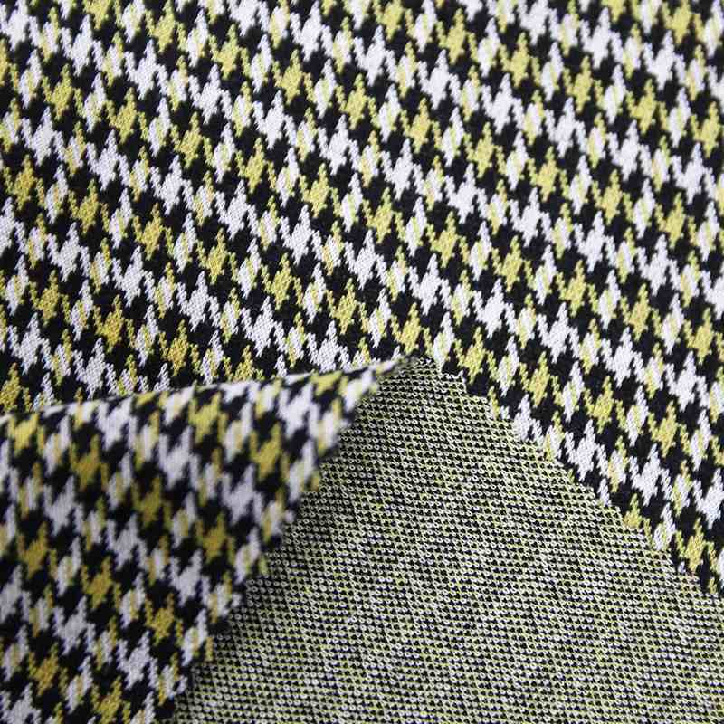 How does the quality and durability of Jacquard Houndstooth fabric compare to other types of fabrics?